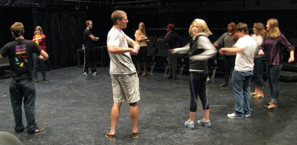 Students learn vocal and physical warm-ups to during Acting Classes at Denison.